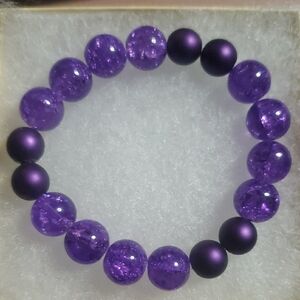 Handmade by my daughter.Purple Beaded Bracelet